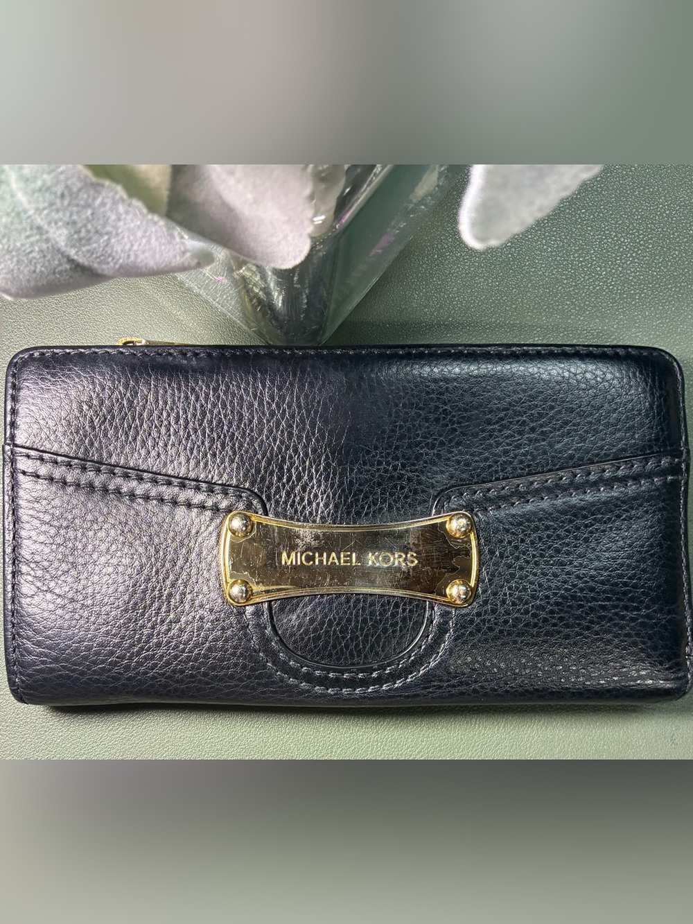 Michael Kors black pebbled-leather continental wallet with gold-tone hardware